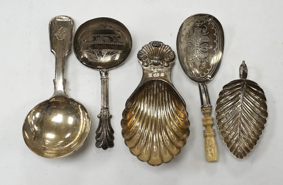 Five assorted silver caddy spoons, including fiddle pattern by Hayne & Cater, London, 1843, foliate terminal handled by George Unite, Birmingham, 1845, bone handled by Hilliard & Thomason, Birmingham, 1879, modern shell